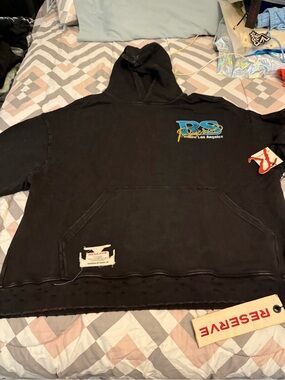 Reserve Black Hoodie with White "Los Angeles" Text and Red Graphic Accent